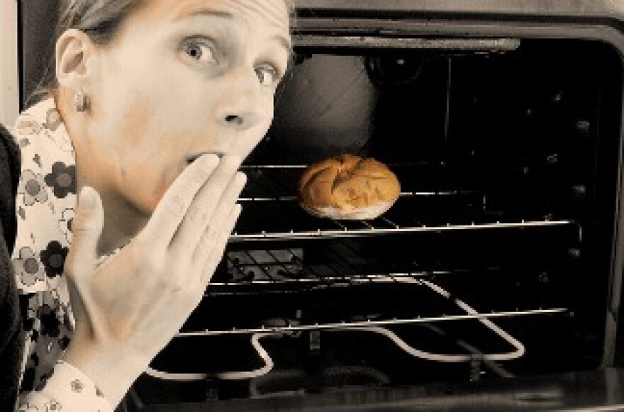 There is a bun in this woman's oven.