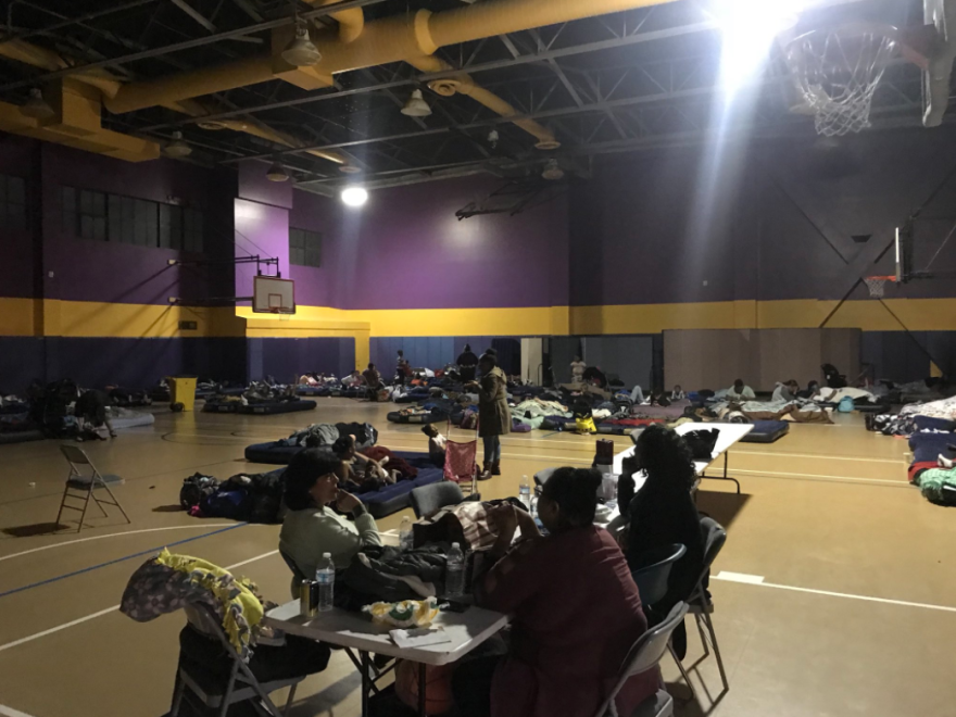 The gym at the Union Rescue Mission in Downtown LA has been used as shelter for some of the women and children evacuated from the Hope Gardens Family Center.