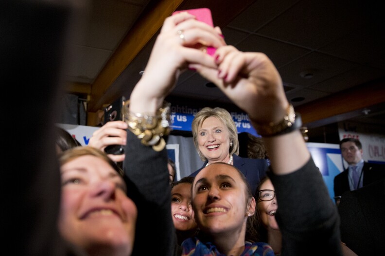 Democratic presidential candidate Hillary Clinton meets with supporters after taking part in the Democratic presidential primary debate with Sen. Bernie Sanders, I-Vt. Thursday, Feb. 4, 2016, in Durham, N.H. (AP Photo/Matt Rourke)