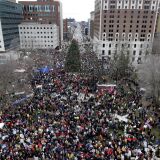 Protesters gather for a rally outside the State Capitol in Lansing, Mich., Tuesday, Dec. 11, 2012. The crowd is protesting right-to-work legislation passed last week. Michigan could become the 24th state with a right-to-work law next week. Rules required a five-day wait before the House and Senate vote on each other's bills; lawmakers are scheduled to reconvene Tuesday and Gov. Snyder has pledged to sign the bills into law. (AP Photo/Paul Sancya)