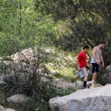 Hikers walk through Eaton Canyon Park on Wednesday afternoon, March 27.