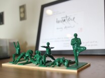 A piece of art in the office of Dr. Greg Serpa at the West Los Angeles VA includes toy army men in yoga poses.