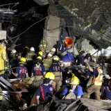 MOORE, OK - MAY 20:  In this handout provided by the U.S. Department of Defense, U.S. Soldiers and Airmen with the Oklahoma Army National Guard and the Oklahoma Air National Guard along with firefighters participate in recovery efforts after a tornado moved through on May 20, 2013 in Moore, Oklahoma. The town reported a tornado to be at least EF4 strength and two miles wide that touched down Monday killing at least 24 people and leveling everything in its path. U.S. President Barack Obama promised federal aid to supplement state and local recovery efforts.  (Photo by Sgt. 1st Class Kendall James/U.S. Department of Defense via Getty Images)
