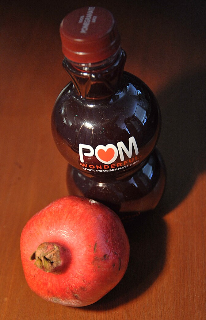 This October 19, 2010 photo illustration shows a bottle of POM Wonderful pomegranate juice. If the claims are to be believed, pomegrante juice can change your life: prevent prostate and breast cancer, protect against heart disease and even alleviate erectile dysfunction. Could it be the elixir from the original fruit of the Garden of Eden ? Not so fast, says the US government, which is suing the group POM Wonderful for making false and deceptive claims about its juice and supplements derived from it. The Federal Trade Commission (FTC) said in a complaint filed in September the juice and supplements firm made "false and unsubstantiated claims that their products will prevent or treat heart disease, prostate cancer, and erectile dysfunction." The case sets up a high-profile battle between the maker of the popular juice and authorities over the claims of a superfood. AFP PHOTO/Karen BLEIER (Photo credit should read KAREN BLEIER/AFP/Getty Images)