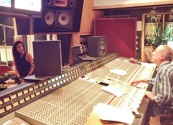 Music producer Larry Klein in the studio with musician Ana Moura. 