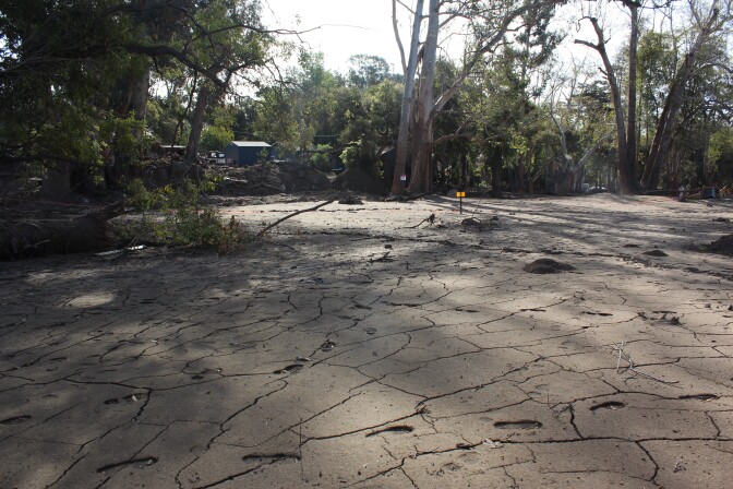 Dried mud covers the ground in an area of Montecito on Thurs., March 8, 2018 that was devastated by a mudslide two months earlier.