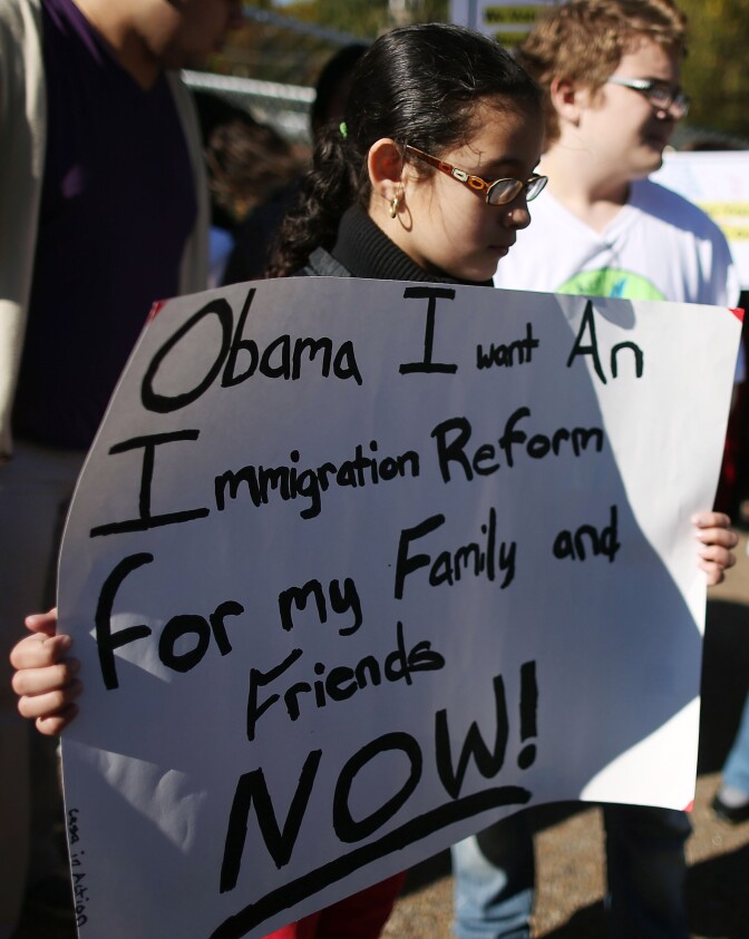 Diana Saravia, 10, participates in a rally with on immigration reform in front of the White House on November 8, 2012 in Washington, DC. Immigrant rights organizations called on President Barack Obama to fulfill his promise of passing comprehensive immigration reform.  