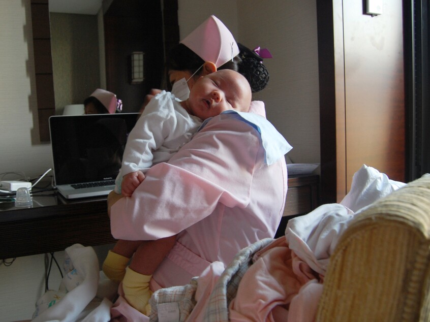 A nurse tends to baby Momo at the Weige Center in Beijing. The center provides luxury accommodation and 24-hour nursing staff to new mothers who participate in the Chinese tradition of "sitting the month," where they don't go outside or bathe for 30 days.