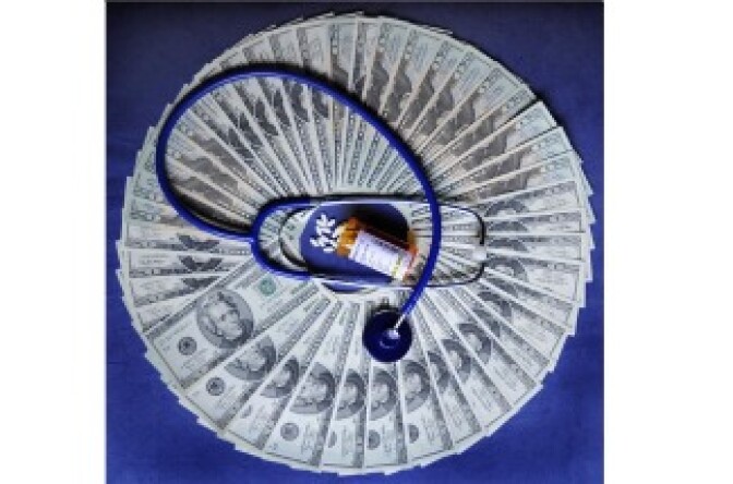 A ring of US twenty dollar bills with a bottle of prescription drugs and a stethoscope.