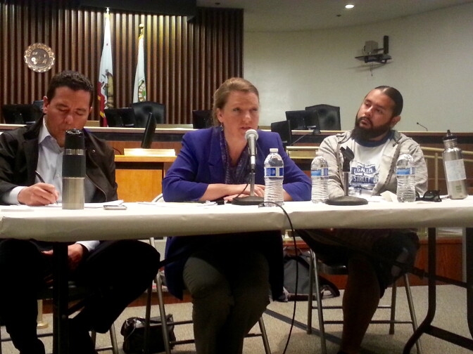 Barbara Lee, the head of the Department of Toxic Substances Control, answers questions from residents about the agency's clean up of lead contamination from the former Exide battery recycling plant.