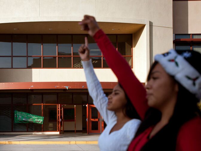 Sophomore Karen Salto, left, and junior Beronica Zermeno take part in cheer practice outside a brand new building at Mark Keppel High School. The space has 22 classrooms, and several class science labs. It is the second-largest building on campus.