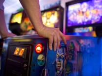Will Stifel plays Monster Bash Pinball during his lunch break at Neon Retro Arcade in Pasadena on Wednesday afternoon, Feb. 4.