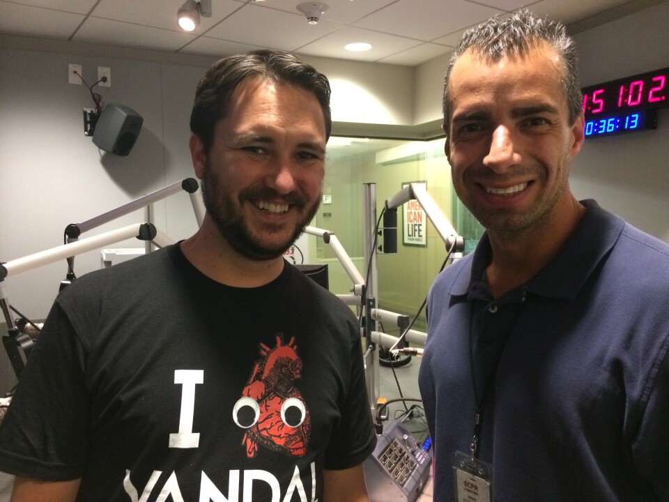 Actor Wil Wheaton and Take Two host A Martinez pose in the KPCC studio. 