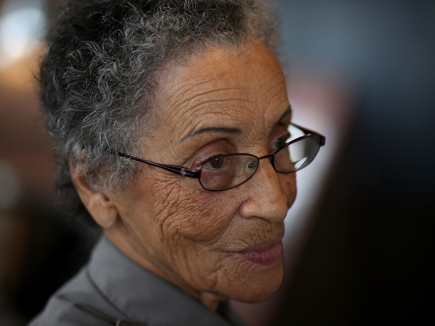 Betty Reid Soskin has salt and pepper hair and wire frame glasses in a close-up profile shot.