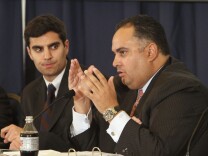 Assembly Speaker John Perez, D-Los Angeles, right, a member of the University of California Board of Regents, called on students to urge Republican lawmakers to approve tax hikes on the rich during a regents meeting held at the University of California, Davis, in Davis Calif., Monday,Nov. 28, 2011. Students, calling for the end of tuition and fee hikes among other things protested at the four UC campuses, Davis, Merced, San Francisco-Mission Bay and Los Angeles, where the regents held a teleconference.  At left is Student Regent Designee Jonathan Stein. (AP Photo/Rich Pedroncelli)