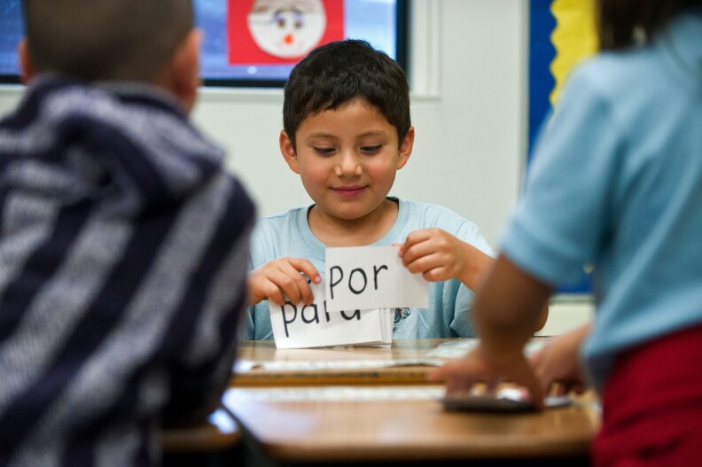 Transitional kindergarten dual language student Jesus Lopez goes through a keycard exercise with his classmates on Wednesday, March 20 at Foster Elementary School. Half of the school is in a dual language program, and the other half of the students are taught in English only.