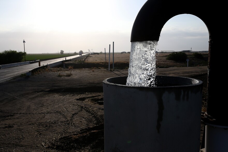 Well water is pumped from the ground on April 24, 2015 in Tulare, California. 