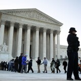 General public with tickets to listen to a hearing on the Obamacare line up for entering the U.S. Supreme Court March 27, 2012 in Washington, DC. The Supreme Court continues to hear oral arguments on the Patient Protection and Affordable Care Act.