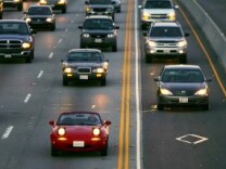 Cars drive in the High Occupancy Vehicle (HOV) lane near Simi Valley, California.