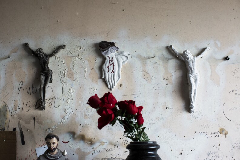 Religious objects found in a tombstone maker's workshop near the Lares Municipal Cemetery.