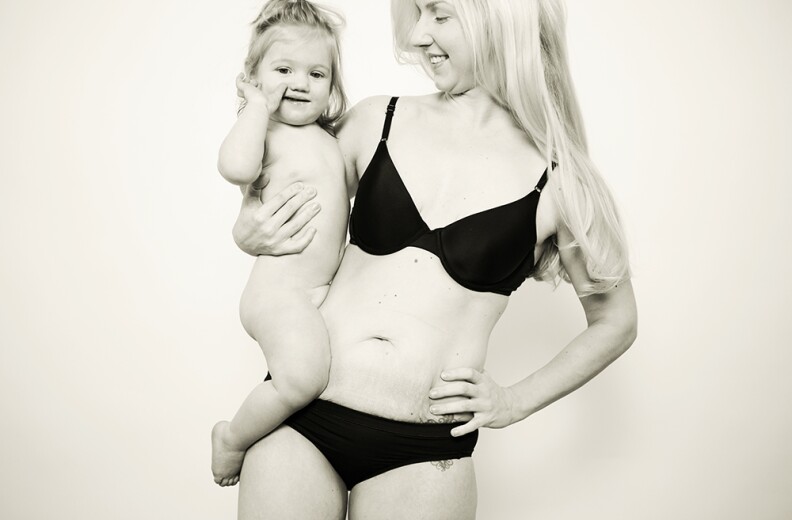 The amazing Amber Kane with 12 month old, Gwenyth. Amber had planned to have a natural vaginal birth with Gwenyth but after labor for almost 11 hours without progressing she consented to a cesarean. Amber struggled with her size during pregnancy and postpartum after having gone from 115 lbs to nearly 200 but has learned to focus on the fact that both she and her baby are healthy and happy