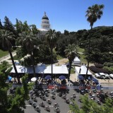 SACRAMENTO, CA - MAY 14:  The peloton rides past the California State Capitol building during Stage 4 of the Amgen Breakaway From Heart Disease Women's Race empowered with SRAM on May 14, 2017 in Sacramento, California.  (Photo by Ezra Shaw/Getty Images)