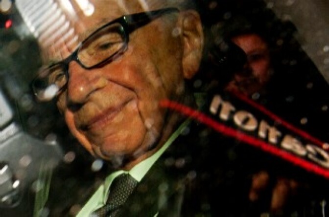 News Corporation Chief Rupert Murdoch leaves his central London home in a car on July 18, 2011.