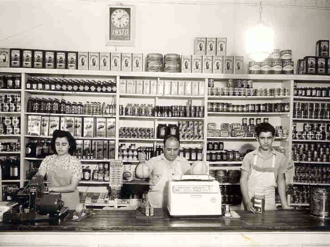 The Mastro family's Italian Market was located on Ord and Broadway in Los Angeles. Once the heart of Little Italy, the area is now the center of Los Angeles' Chinatown. Pictured are Joe Mastro, center, with son, Vito, and daughter, Mary.