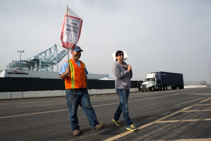 Clerical workers at the Port of Los Angeles protest outside of the APM Terminals on December 4th, 2012.