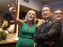 Los Angeles County Supervisor District 5 candidate Kathryn Barger watches election coverage with Mayor of Duarte Sam Kang during Barger's election party at Sorriso in Pasadena on Tuesday night, June 7, 2016 during the California primary.