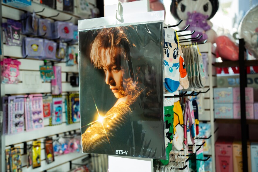 Film strips of photographs of different groups of people against colored backgrounds, including blue, purple and pink.