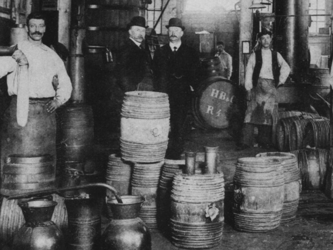 Workers pose for a photo at the Hoboken de Bie & Co. gin distillery in Rotterdam, Netherlands, circa 1900. By the end of the 19th century, cocktail culture had helped make gin a more respectable spirit.