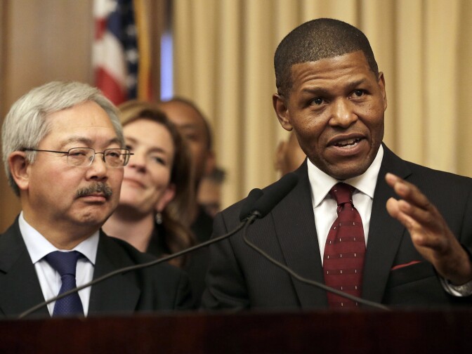 San Francisco Police Chief William Scott, right, speaks next to Mayor Ed Lee at a news conference in San Francisco, Tuesday, Dec. 20, 2016. San Francisco appointed Scott, a deputy chief of the Los Angeles Police Department, to head the city police department as it deals with a number of racially charged issues.