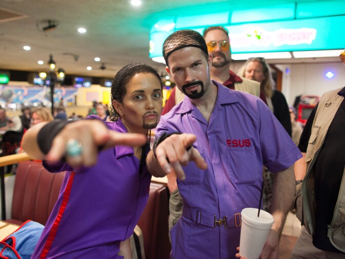 Lebowski Fest attendees dressed as Jesus Quintana from the film, "The Big Lebowski," pose during the costume contest at Fountain Bowl in Fountain Valley, Calif. on Saturday, Mar. 14, 2015.