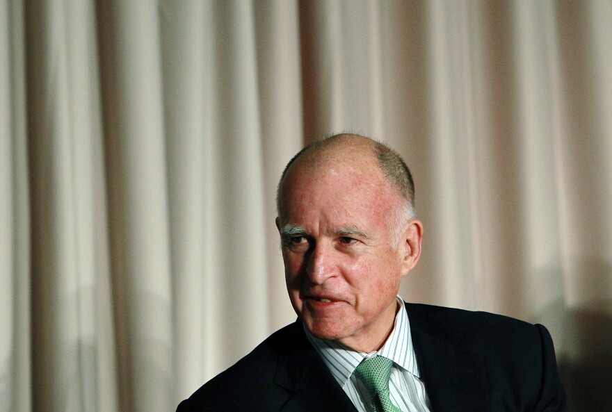 File: California Gov. Jerry Brown looks on during The Governor's Conference on Extreme Climate Risks and California's Future on December 15, 2011 in San Francisco, California.