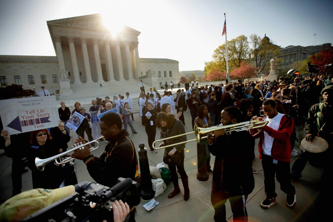 Demonstrators for and against the Patient Protection and Affordable Care Act march and chant in outside the U.S. Supreme Court Building on March 26, 2012, in Washington, DC. Today the high court, which has set aside six hours over three days, will hear arguments over the constitutionality of the act.