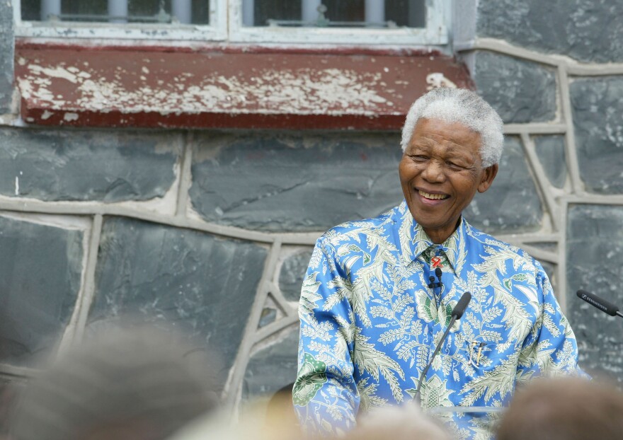 Nelson Mandela outside his former prison cell attends a press conference for '46664 - Give One Minute of Your Life to AIDS' on No. 28, 2003 on Robben Island, off the coast of Cape Town, South Africa.