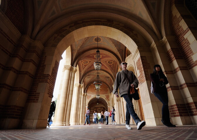 LOS ANGELES, CA - APRIL 23:  Students walk near Royce Hall on the campus of UCLA on April 23, 2012 in Los Angeles, California. According to reports, half of recent college graduates with bachelor's degrees are finding themselves underemployed or jobless.  (Photo by Kevork Djansezian/Getty Images)
