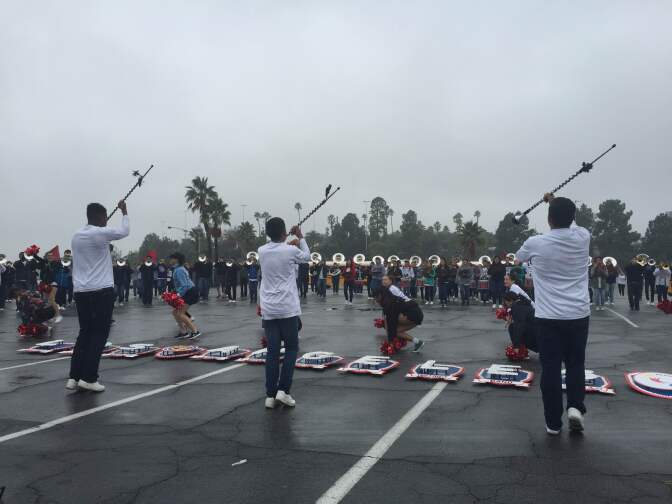 Drum majors lead the band during a performance outside of Dodger Stadium. The band was recognized by the Tournament of Roses for participating in the parade for 44 years in a row.