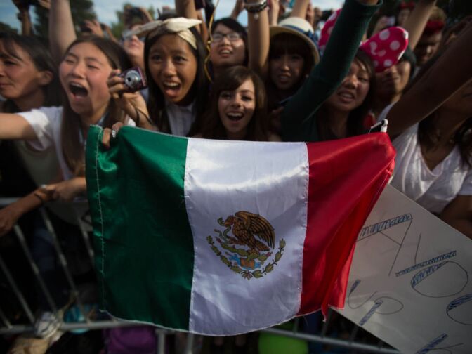 Fans cheer B.A.P. a Korean pop group at KCON. Korean pop is looking to extend its influence beyond Korea and increasingly seeking fans in the West.