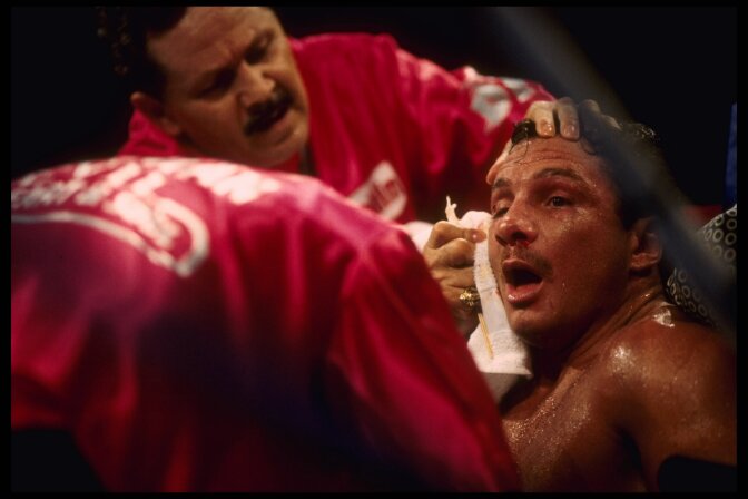 25 Jun 1995:  Boxer Vinny Pazienza is cleaned up in his corner by his trainers during their bout in Atlantic City, New Jersey.  Opponent Roy Jones Jr. retained his International Boxing Federation Super middleweight title by defeating Pazienza in the sixth