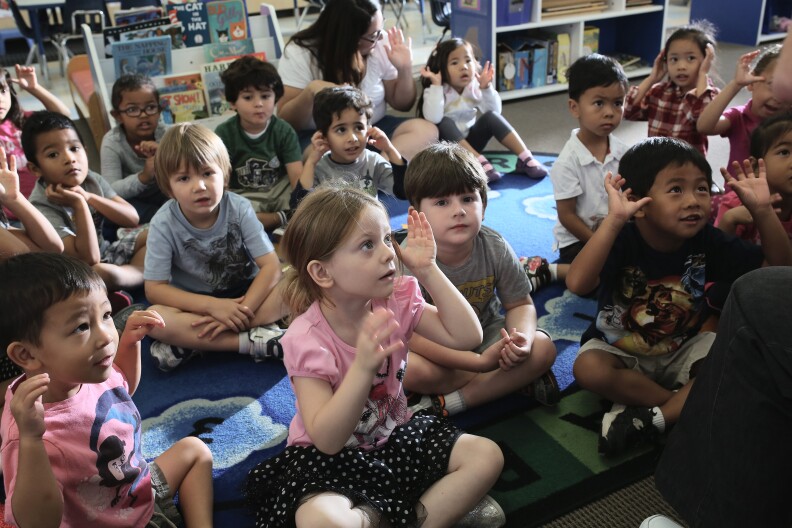 SAN DIEGO, CA - OCTOBER 01:  Children at Scripps Ranch KinderCare in San Diego play in their classroom on October 1, 2013 in San Diego, CA. Later, LuAnn Cline, a Prekindergarten teacher at the center, was surprised with the Early Childhood Educator Award and a $10,000 check from Knowledge Universe.  (Photo by Robert Benson/Getty Images for Knowledge Universe)