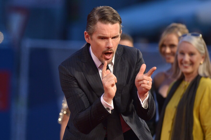 US actor Ethan Hawke arrives for the screening of the movie 'Good Kill' presented in competition at the 71st Venice Film Festival on September 5, 2014 at Venice Lido. AFP PHOTO / TIZIANA FABI (Photo credit should read TIZIANA FABI/AFP/Getty Images)