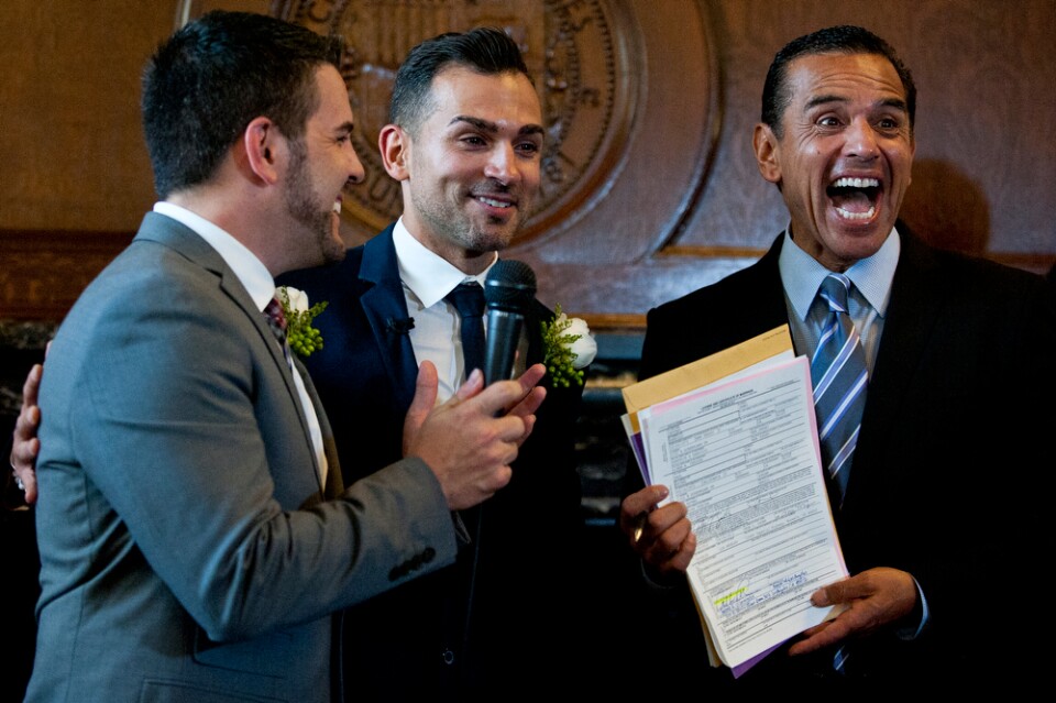 Paul Katami and Jeff Zarrillo, plaintiffs in the Supreme Court case that overturned California's same-sex marriage ban, became the first gay couple to wed in Los Angeles since 2008 on Friday at City Hall. Outgoing Mayor Antonio Villaraigosa officiated the ceremony.