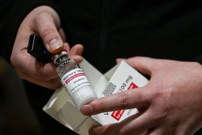 This picture shows a vial of Remdesivir at Movianto premises, as parcels of drugs are being sent to India, in Aalst, on April 30, 2021. - Belgium will help India, where the situation in the ongoing pandemic is very severe, with 9000 doses of the antiviral drug Remdesivir. The pharmaceuticals have to be packed in special cases before they leave on a flight tonight. - Belgium OUT (Photo by DIRK WAEM / various sources / AFP) / Belgium OUT (Photo by DIRK WAEM/Belga/AFP via Getty Images)