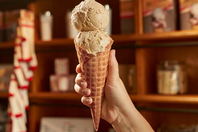 Pumpkin spiced ice cream on a waffle cone f