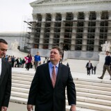 WASHINGTON, DC - OCTOBER 8:  Shaun McCutcheon (C) plaintiff in a case of McCutcheon v. Federal Election Commission, leaves the Supreme Court on October 8, 2013 in Washington, DC. The court heard oral arguments in McCutcheon v. Federal Election Committee, a first amendment case that will determine how much money an individual can contribute directly to political campaigns. (Photo by Drew Angerer/Getty Images)