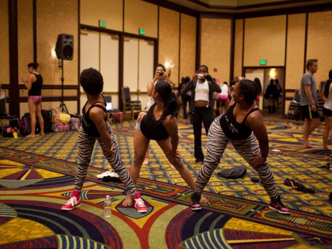 Convention participants pose for photographs after a workshop on June 24.