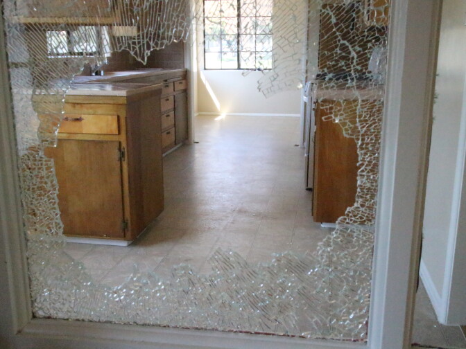 A foreclosed home in San Bernardino that has been vandalized. 