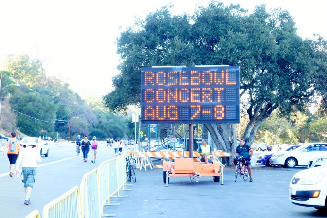 Signs around the Rose Bowl warn of expected traffic delays for concerts.